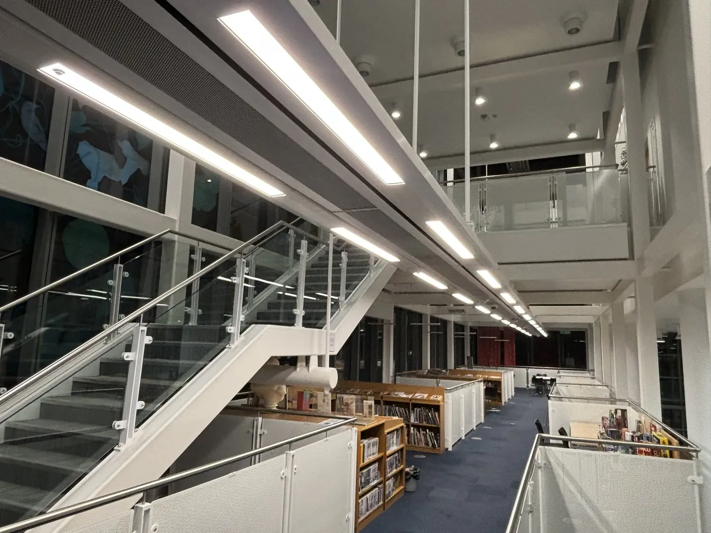 Library atrium with linear LED pendant lighting